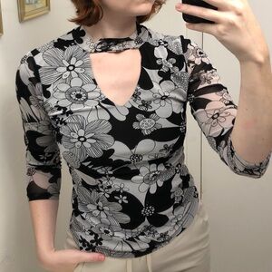 Black and white floral mesh top with a touch of retro charm